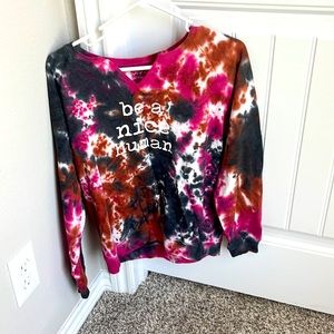A casual “ be a nice human” sweatshirt